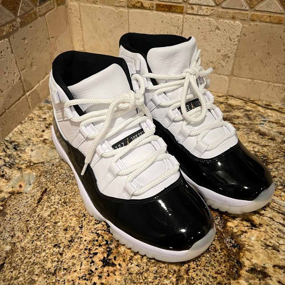 Air Jordan 11 Retro Black and White Sneakers